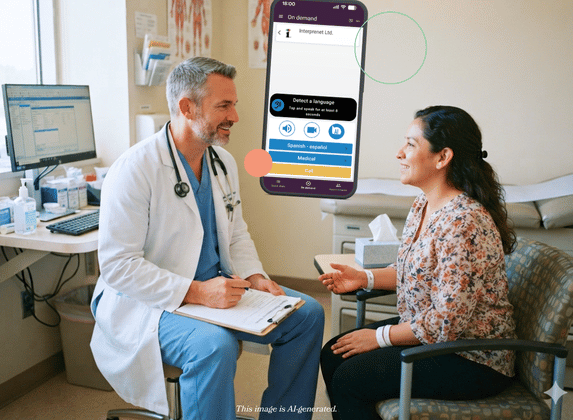 Doctor and LEP patient communicating in a treatment room. The Interprenet On-Demand AI Interpretation app in the background.