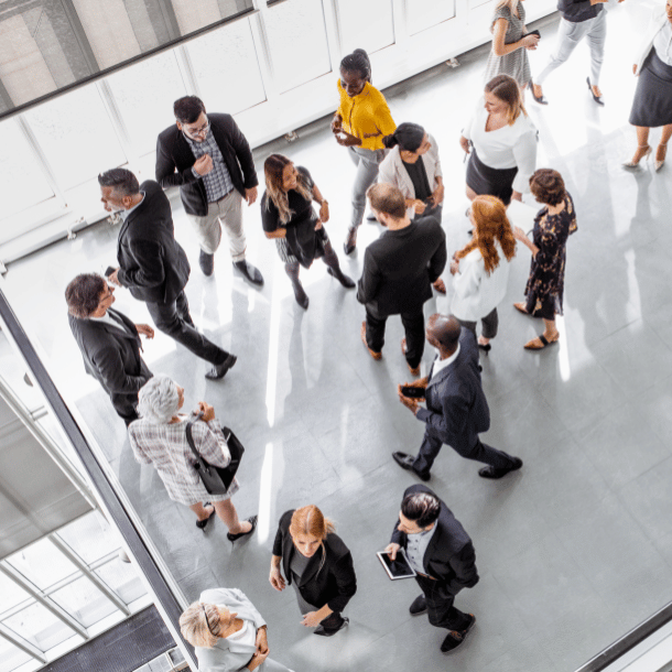 Conference attendees mingling at an event