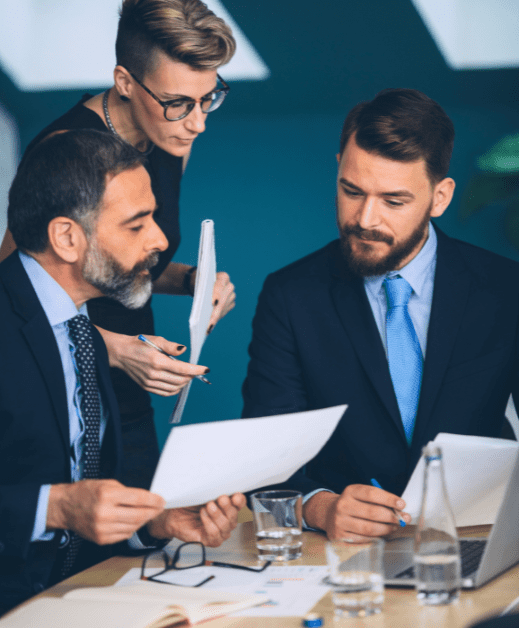Group of people in suits working