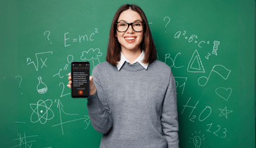 Teacher holding a smartphone showing the Interprenet Classroom Language Assistant