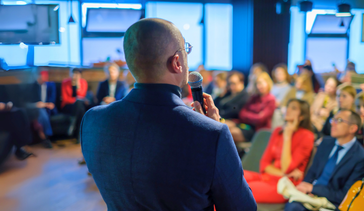 Event speaker at a large conference